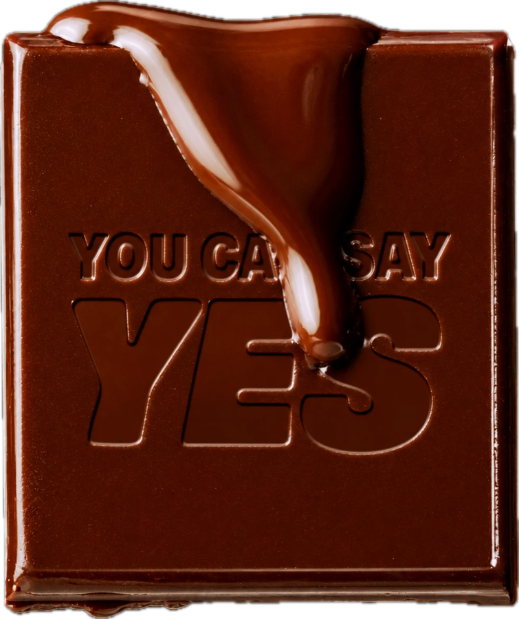 A square of dark chocolate with melted chocolate flowing over it and the words YOU CAN SAY YES embossed in it